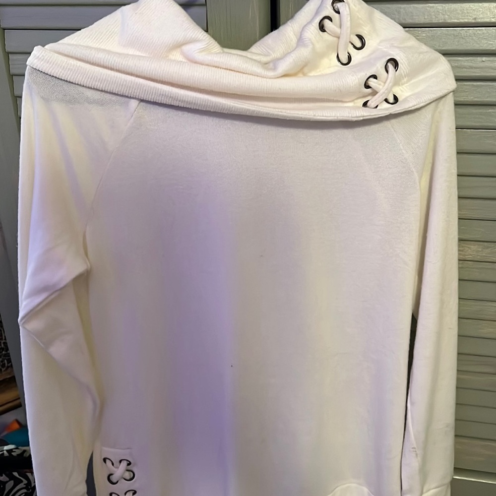 Long sleeve White sweater dress or oversized sweater.